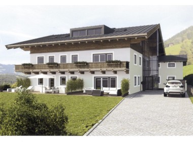 Luxuswohnungen Kitzbühel, Hausansicht außen mit Garten