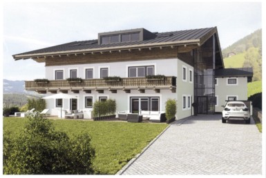 Luxuswohnungen Kitzbühel, Hausansicht außen mit Garten